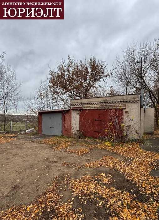 В продаже большой гараж с ямой и погребом в посёлке Холмы. 

Гараж у